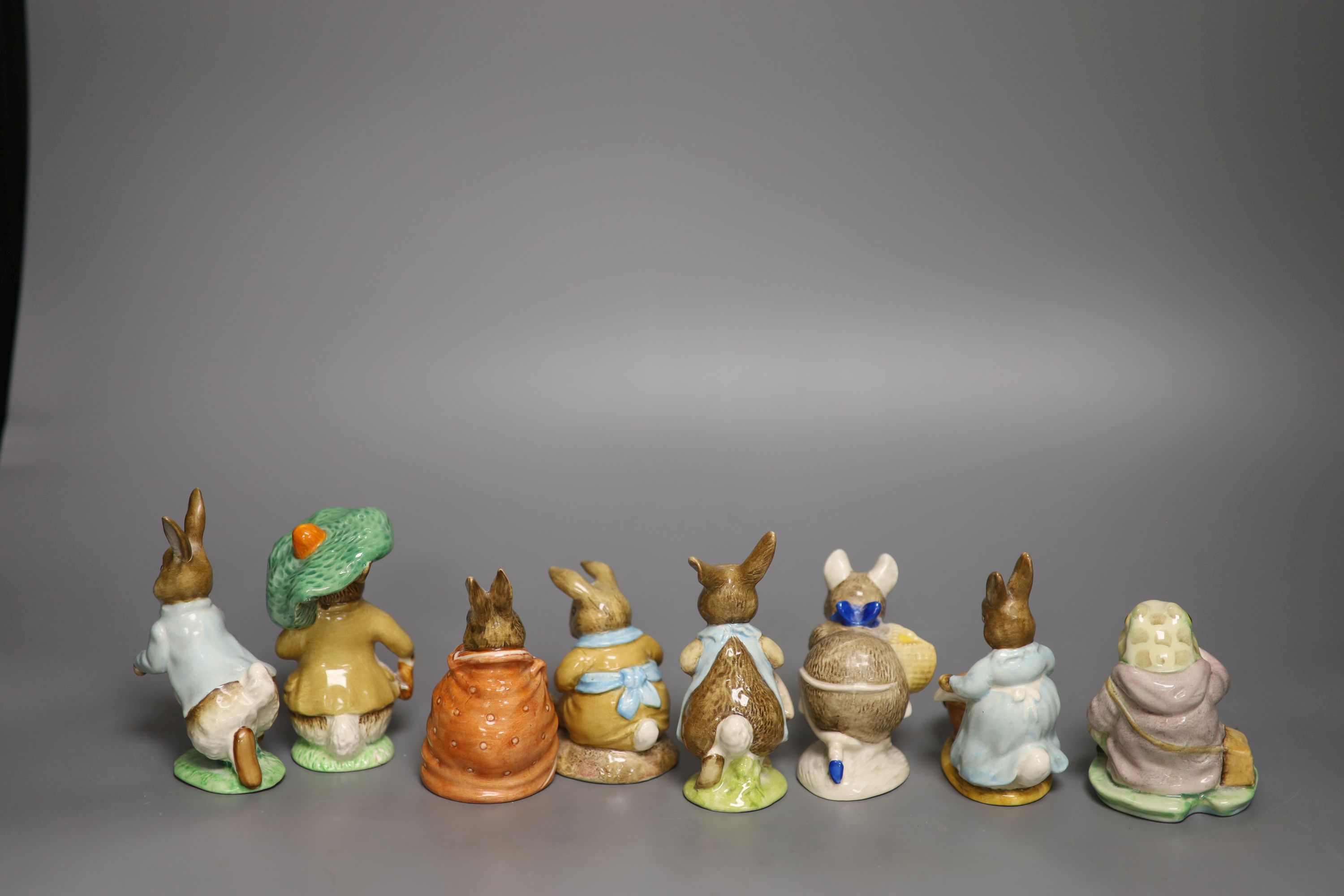 Beatrix Potter figures, seven Beswick and one Royal Albert,